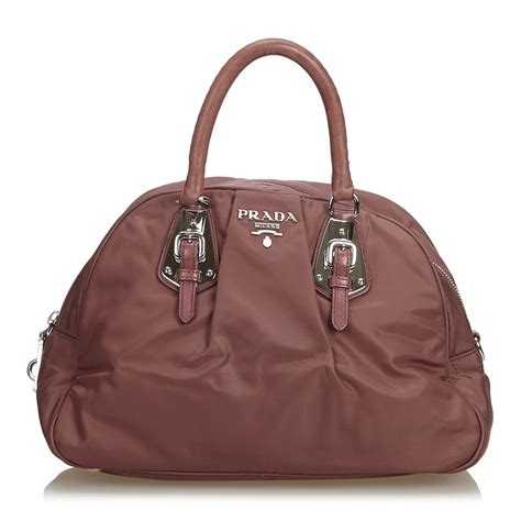 leather prada bag with curvy design stitching|prada vintage nylon bag.